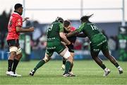 23 March 2024; Quan Horn of Emirates Lions in action against Darragh Murray, left, and Sam Illo of Connacht during the United Rugby Championship match between Connacht and Emirates Lions at Dexcom Stadium in Galway. Photo by Piaras Ó Mídheach/Sportsfile