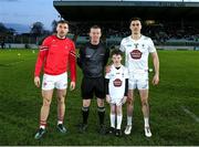 23 March 2024; Referee Joe McQuillan with team captains Sam Mulroy of Louth, and Mick O'Grady of Kildare along with mascot Tom Cassidy, age 8, from Caragh, before the Allianz Football League Division 2 match between Kildare and Louth at Netwatch Cullen Park in Carlow. Photo by Michael P Ryan/Sportsfile