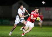 23 March 2024; Conall McKeever of Louth in action against Mick O'Grady of Kildare during the Allianz Football League Division 2 match between Kildare and Louth at Netwatch Cullen Park in Carlow. Photo by Michael P Ryan/Sportsfile