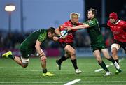 23 March 2024; JC Pretorius of Emirates Lions is tackled by Jack Carty, right, and Cian Prendergast of Connacht during the United Rugby Championship match between Connacht and Emirates Lions at Dexcom Stadium in Galway. Photo by Piaras Ó Mídheach/Sportsfile