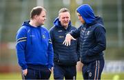 24 March 2024; Roscommon manager Davy Burke, left, and Ronan Daly before the Allianz Football League Division 1 match between Derry and Roscommon at Celtic Park in Derry. Photo by Ramsey Cardy/Sportsfile
