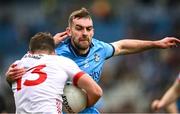 24 March 2024; Darren McCurry of Tyrone is tackled by Seán MacMahon of Dublin during the Allianz Football League Division 1 match between Dublin and Tyrone at Croke Park in Dublin. Photo by Ray McManus/Sportsfile