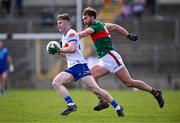 24 March 2024; Colm Lennon of Monaghan in action against Aidan O'Shea of Mayo during the Allianz Football League Division 1 match between Monaghan and Mayo at St Tiernach's Park in Clones, Monaghan. Photo by Ben McShane/Sportsfile