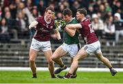 24 March 2024; Barry Dan O'Sullivan of Kerry is tackled by John Daly and Cathal Sweeney of Galway during the Allianz Football League Division 1 match between Kerry and Galway at Fitzgerald Stadium in Killarney, Kerry. Photo by Brendan Moran/Sportsfile