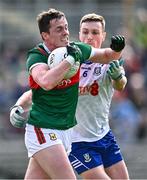 24 March 2024; Stephen Coen of Mayo in action against Killian Lavelle of Monaghan during the Allianz Football League Division 1 match between Monaghan and Mayo at St Tiernach's Park in Clones, Monaghan. Photo by Ben McShane/Sportsfile
