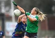 24 March 2024; Emma Coogan of Carlow is dispossessed by Shannan McQuade of Fermanagh during the Lidl LGFA National League Division 4 semi-final match between Fermanagh and Carlow at Dowdallshill GAA Club in Dundalk, Louth. Photo by Tyler Miller/Sportsfile