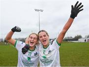 24 March 2024; Limerick players Iris Kennelly, left, and Róisín Ambrose celebrate after their side's victory in the Lidl LGFA National League Division 4 semi-final match between Leitrim and Limerick at Pádraig Pearses GAA Club in Roscommon. Photo by Seb Daly/Sportsfile