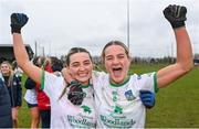 24 March 2024; Limerick players Meadhbh MacNamara, left, and Róisín Ambrose celebrate after their side's victory in the Lidl LGFA National League Division 4 semi-final match between Leitrim and Limerick at Pádraig Pearses GAA Club in Roscommon. Photo by Seb Daly/Sportsfile