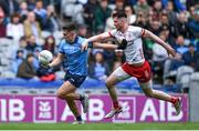 24 March 2024; Lorcan O'Dell of Dublin is tackled by Nathan McCarron of Tyrone during the Allianz Football League Division 1 match between Dublin and Tyrone at Croke Park in Dublin. Photo by Shauna Clinton/Sportsfile