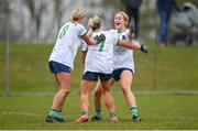 24 March 2024; Limerick players, from right, Iris Kennelly, Meadhbh MacNamara and Róisín Ambrose celebrate after their side's victory in the Lidl LGFA National League Division 4 semi-final match between Leitrim and Limerick at Pádraig Pearses GAA Club in Roscommon. Photo by Seb Daly/Sportsfile