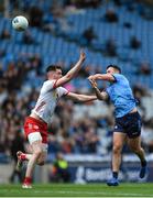 24 March 2024; Niall Scully of Dublin in action against Nathan McCarron of Tyrone during the Allianz Football League Division 1 match between Dublin and Tyrone at Croke Park in Dublin. Photo by Shauna Clinton/Sportsfile