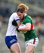 24 March 2024; Padraig O'Hora of Mayo and Ryan O'Toole of Monaghan tussle during the Allianz Football League Division 1 match between Monaghan and Mayo at St Tiernach's Park in Clones, Monaghan. Photo by Ben McShane/Sportsfile