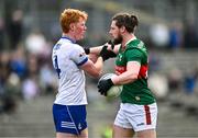 24 March 2024; Padraig O'Hora of Mayo and Ryan O'Toole of Monaghan tussle during the Allianz Football League Division 1 match between Monaghan and Mayo at St Tiernach's Park in Clones, Monaghan. Photo by Ben McShane/Sportsfile
