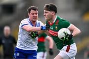 24 March 2024; James Carr of Mayo is tackled by Ryan Wylie of Monaghan during the Allianz Football League Division 1 match between Monaghan and Mayo at St Tiernach's Park in Clones, Monaghan. Photo by Ben McShane/Sportsfile