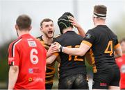 24 March 2024; Colm Craigie of Ashbourne, centre, is congratulated by team mates after scoring their first try during the Bank of Ireland Provincial Towns Cup Third Round match between Cill Dara RFC and Ashbourne RFC at Cill Dara RFC in Kildare. Photo by David Fitzgerald/Sportsfile