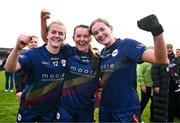 24 March 2024; Carlow players, from left, Sara Doyle, Sinead Hayden, and Maeve O'Neill celebrate after the Lidl LGFA National League Division 4 semi-final match between Fermanagh and Carlow at Dowdallshill GAA Club in Dundalk, Louth. Photo by Tyler Miller/Sportsfile