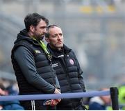 24 March 2024; Tyrone manager Brian Dooher, right, and Tyrone selector Joe McMahon during the Allianz Football League Division 1 match between Dublin and Tyrone at Croke Park in Dublin. Photo by Shauna Clinton/Sportsfile