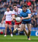24 March 2024; Brian O'Leary of Dublin is tackled by Ciarán Daly of Tyrone during the Allianz Football League Division 1 match between Dublin and Tyrone at Croke Park in Dublin. Photo by Ray McManus/Sportsfile