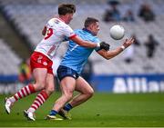24 March 2024; Brian Howard of Dublin is tackled by Aodhan Donaghy of Tyrone during the Allianz Football League Division 1 match between Dublin and Tyrone at Croke Park in Dublin. Photo by Ray McManus/Sportsfile