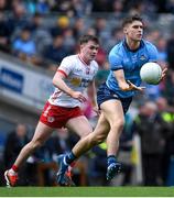 24 March 2024; Theo Clancy of Dublin in action against Ruairí Canavan of Tyrone during the Allianz Football League Division 1 match between Dublin and Tyrone at Croke Park in Dublin. Photo by Shauna Clinton/Sportsfile