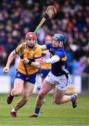 24 March 2024; Darragh Lohan of Clare in action against Conor Bowe of Tipperary during the Allianz Hurling League Division 1 semi-final match between Clare and Tipperary at Laois Hire O'Moore Park in Portlaoise, Laois. Photo by Piaras Ó Mídheach/Sportsfile