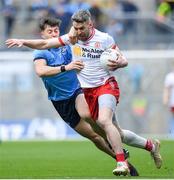 24 March 2024; Matthew Donnelly of Tyrone is tackled by Killian McGinnis of Dublin during the Allianz Football League Division 1 match between Dublin and Tyrone at Croke Park in Dublin. Photo by Shauna Clinton/Sportsfile
