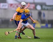 24 March 2024; Seán Hayes of Tipperary in action against Cian Galvin of Clare during the Allianz Hurling League Division 1 semi-final match between Clare and Tipperary at Laois Hire O'Moore Park in Portlaoise, Laois. Photo by Piaras Ó Mídheach/Sportsfile