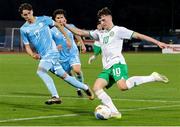 22 March 2024; Adam Murphy of Republic of Ireland in action against Filippo Pasolini of San Marino during the UEFA European Under-21 Championship qualifier match between San Marino and Republic of Ireland at San Marino Stadium in Serravalle, San Marino. Photo by Roberto Bregani/Sportsfile