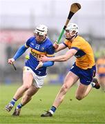 24 March 2024; Séan Ryan of Tipperary in action against Cian Galvin of Clare during the Allianz Hurling League Division 1 semi-final match between Clare and Tipperary at Laois Hire O'Moore Park in Portlaoise, Laois. Photo by Piaras Ó Mídheach/Sportsfile