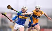 24 March 2024; Séan Ryan of Tipperary in action against Cian Galvin of Clare during the Allianz Hurling League Division 1 semi-final match between Clare and Tipperary at Laois Hire O'Moore Park in Portlaoise, Laois. Photo by Piaras Ó Mídheach/Sportsfile