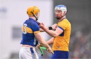 24 March 2024; Diarmuid Ryan of Clare and Patrick Maher of Tipperary tussle during the Allianz Hurling League Division 1 semi-final match between Clare and Tipperary at Laois Hire O'Moore Park in Portlaoise, Laois. Photo by Piaras Ó Mídheach/Sportsfile