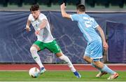 22 March 2024; Rocco Vata of Republic of Ireland in action against Alessandro Gianbalvo of San Marino during the UEFA European Under-21 Championship qualifier match between San Marino and Republic of Ireland at San Marino Stadium in Serravalle, San Marino. Photo by Roberto Bregani/Sportsfile