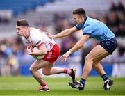 24 March 2024; Ruairí Canavan of Tyrone is tackled by Eóin Murchan of Dublin during the Allianz Football League Division 1 match between Dublin and Tyrone at Croke Park in Dublin. Photo by Ray McManus/Sportsfile