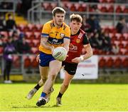 24 March 2024; Micheal Garry of Clare in action against Down during the Allianz Football League Division 3 match between Down and Clare at Páirc Esler in Newry, Down. Photo by Matt Browne/Sportsfile