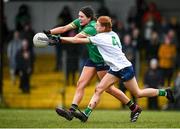24 March 2024; Vivienne Egan of Leitrim in action against Fiona Bradshaw of Limerick during the Lidl LGFA National League Division 4 semi-final match between Leitrim and Limerick at Pádraig Pearses GAA Club in Roscommon. Photo by Seb Daly/Sportsfile