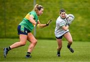 24 March 2024; Deborah Murphy of Limerick in action against Megan McGovern of Leitrim during the Lidl LGFA National League Division 4 semi-final match between Leitrim and Limerick at Pádraig Pearses GAA Club in Roscommon. Photo by Seb Daly/Sportsfile