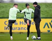 25 March 2024; Interim head coach John O'Shea with Evan Ferguson, left, and Will Smallbone during a Republic of Ireland training session at FAI National Training Centre in Abbotstown, Dublin. Photo by Stephen McCarthy/Sportsfile