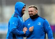 25 March 2024; Andrew Porter, right, and Jack Conan share a joke during Leinster rugby squad training at Energia Park in Dublin. Photo by Sam Barnes/Sportsfile