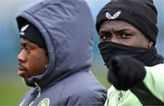 25 March 2024; Festy Ebosele and Michael Obafemi, left, during a Republic of Ireland training session at FAI National Training Centre in Abbotstown, Dublin. Photo by Stephen McCarthy/Sportsfile