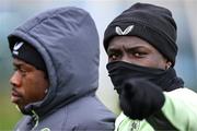 25 March 2024; Festy Ebosele and Michael Obafemi, left, during a Republic of Ireland training session at FAI National Training Centre in Abbotstown, Dublin. Photo by Stephen McCarthy/Sportsfile