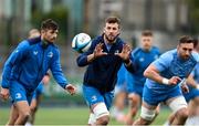 25 March 2024; Caelan Doris, centre, during Leinster rugby squad training at Energia Park in Dublin. Photo by Sam Barnes/Sportsfile