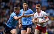 24 March 2024; Seanie O'Donnell of Tyrone is tackled by Cian Murphy of Dublin during the Allianz Football League Division 1 match between Dublin and Tyrone at Croke Park in Dublin. Photo by Shauna Clinton/Sportsfile