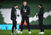26 March 2024; Republic of Ireland players, from left, Mikey Johnston, Jake O'Brien and Robbie Brady before the international friendly match between Republic of Ireland and Switzerland at the Aviva Stadium in Dublin. Photo by Ben McShane/Sportsfile