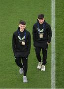 26 March 2024; Republic of Ireland players Andy Moran, left, and Joe Hodge walk the pitch before the international friendly match between Republic of Ireland and Switzerland at the Aviva Stadium in Dublin. Photo by Michael P Ryan/Sportsfile