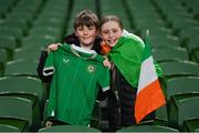 26 March 2024; Republic of Ireland supporters Joe, left, age 9, and Ellie Moran, age 11, from Bray in Wicklow, before the international friendly match between Republic of Ireland and Switzerland at the Aviva Stadium in Dublin. Photo by Ben McShane/Sportsfile