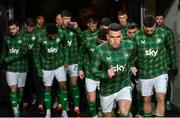 26 March 2024; Repiblic of Ireland captain Seamus Coleman leads his side out for the warm-up before the international friendly match between Republic of Ireland and Switzerland at the Aviva Stadium in Dublin. Photo by Stephen McCarthy/Sportsfile