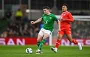 26 March 2024; Seamus Coleman of Republic of Ireland in action against Dan Ndoye of Switzerland during the international friendly match between Republic of Ireland and Switzerland at the Aviva Stadium in Dublin. Photo by Ben McShane/Sportsfile