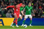 26 March 2024; Dan Ndoye of Switzerland in action against Seamus Coleman of Republic of Ireland during the international friendly match between Republic of Ireland and Switzerland at the Aviva Stadium in Dublin. Photo by Stephen McCarthy/Sportsfile