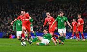 26 March 2024; Zeki Amdouni of Switzerland is tackled by Dara O'Shea of Republic of Ireland leading to a free kick, which was subsequently scored by Xherdan Shaqiri of Switzerland, not pictured, for their side's first goal, during the international friendly match between Republic of Ireland and Switzerland at the Aviva Stadium in Dublin. Photo by Tyler Miller/Sportsfile