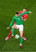 26 March 2024; Evan Ferguson of Republic of Ireland in action against Fabian Schär of Switzerland during the international friendly match between Republic of Ireland and Switzerland at the Aviva Stadium in Dublin. Photo by Michael P Ryan/Sportsfile
